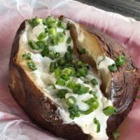 Mesquite Smoked Baked Potato · Comes with butter, sour cream and chives.