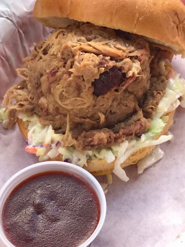 Pulled Pork BBQ Sandwich · Piled high on a thin layer of coleslaw.