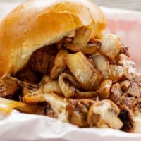 The Burnt Ends Steak Sandwich · Our delicious burnt ends covered in mozzarella cheese, grilled onions, mushrooms and steak s...