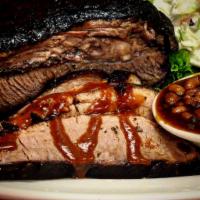 Beef Brisket Dinner · Beef brisket slowly smoked 14 hours. Served with 2 sides and a dinner roll.
