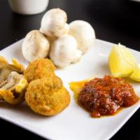 Breaded Mushrooms · Served with you choice of Marinara or Ranch Sauce, from 10 to 12 piece in each order