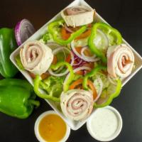 Chef's Salad · Lettuce, tomato, onion, green peppers, ham, turkey and provolone. Included a side of Garlic ...