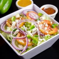 Greek Salad · Lettuce, tomato, onions, green peppers, and feta cheese. Included a side of Garlic Bread and...