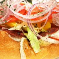 The Rebel Sandwich · Sliced pepperoni, Genoa salami, ham, provolone cheese, lettuce, fresh tomato, red onion, ban...