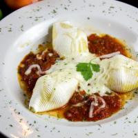 Stuffed Shells · Served with homemade marinara covered with mozzarella cheese.