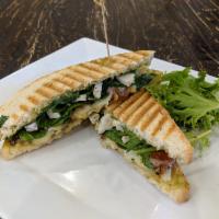 Grilled Chicken Panini · Oven-roasted tomatoes, mozzarella cheese, spinach and basil pesto aioli.