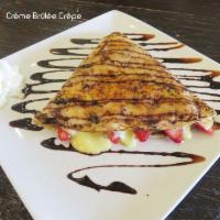 Creme Brulee Crepe · Strawberries, chocolate sauce and caramelized sugar.