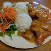 37. Curry Chicken Katsu with Cheese · Crispy breaded fried chicken & topped w/cheese and covered w/curry.