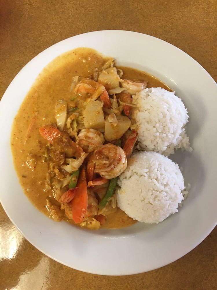 50. Thai Curry with Seafood · 2 scoops of rice, potato, carrots, cabbage. Spicy.
