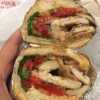 Athena Sandwich · Grilled chicken, roasted peppers, feta, lettuce, tomatoes, onions and chef’s own tomato bals...