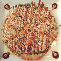 Sushi Pizza · Layer of avocado ,spicy tuna,seaweed salad on flat bread served with chef special sauce.