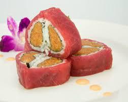 Sweetie Roll · Crunchy spicy tuna, wrapped with tuna served with sweet chili sauce.