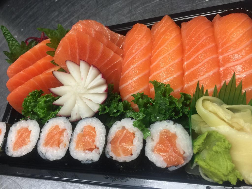 Salmon Lover · 4 pieces of salmon sushi. 6 pieces of salmon sashimi and salmon roll. Your choice of miso soup or house salad.