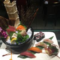 Daily Catch Sushi and Sashimi Combo · 4 pieces of sushi, 8 pieces of sashimi and chef's special roll. Your choice of miso soup or ...