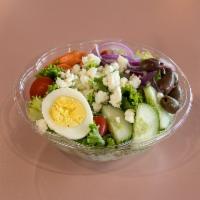 Greek Salad · Our fresh garden salad with olives, feta and red onion.