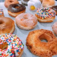 Dozen Donuts · Select your mix of 12 fresh donuts. Fresh, Handcrafted, & Made Daily, on-site!