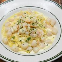 Seafood Fettuccini · Sautéed Bay Scallops and Shrimp in a Garlic Parmesan Cream