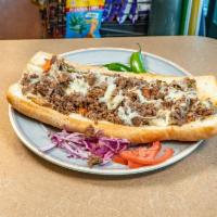 B1. Cheesesteak Sandwich · Grilled steak, onions, green peppers, red peppers, lettuce, tomatoes, mayonnaise, and banana...