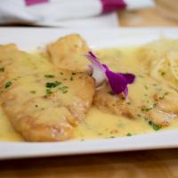Chicken Francese · Lightly battered and sauteed in lemon and white wine sauce. Served with side salad, your cho...