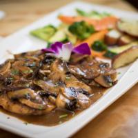 Chicken Marsala · Sauteed in a Marsala wine sauce with fresh mushrooms. Served with side salad, your choice of...