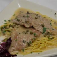 Chicken Picatta · Chicken breast sauteed in a white wine, lemon and capers. Served with side salad, your choic...