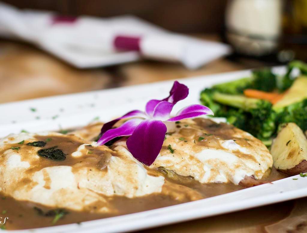 Chicken Sorrentino · Topped with eggplant, fresh mozzarella and prosciutto in a demi glaze sauce. Served with side salad, your choice of pasta or roasted potatoes and vegetables.