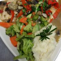 Chicken Mediterranean · Chicken breast sauteed in a lemon and white wine sauce, with artichoke hearts, mushrooms and...