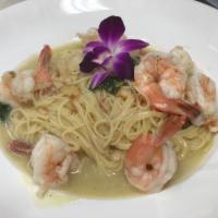 Shrimp Scampi · Jumbo shrimp, garlic white wine lemon sauce. Served with side salad, your choice of pasta or...