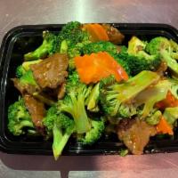 55. Broccoli Beef · Beef stir-fried with broccoli and carrots in brown sauce.