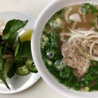 Beef Pho · Rice noodles, sliced beef, beef brisket, scallion, cilantro, onion, bean sprouts, Asian basi...