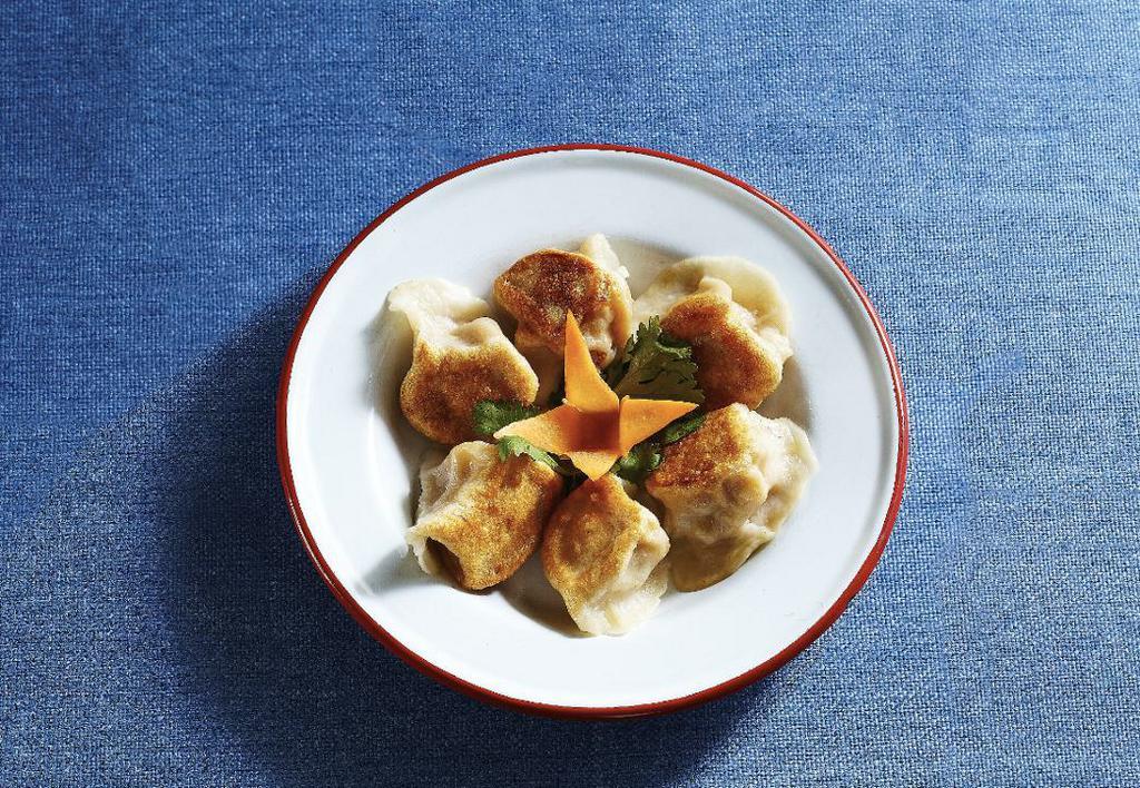 Vegetable Dumplings · 6 handmade dumplings per order. Filled with wood ear mushrooms, carrots, vermicelli, Chinese cabbage and scallions.