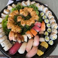 Party Platter B · 71-80 pieces. The platter consists of:

2 California rolls

- Your choice of 2 Basic rolls: ...