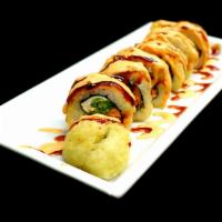 Spicy Salmon Tempura Roll · Salmon, avocado, jalapeno and cream cheese with unagi sauce and spicy mayo. Spicy.