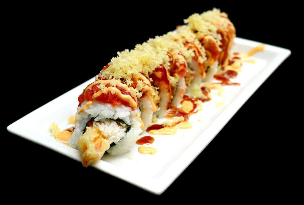 Red Dragon Roll · Shrimp tempura and spicy crab topped with spicy tuna, unagi sauce, spicy mayo and crunchies. Spicy.