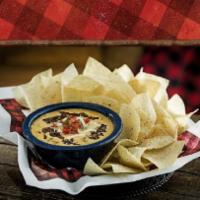 Chipotle Queso and Chips · Add version chili or cup of fire roasted salsa for an additional charge.