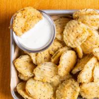 Fried Pickles · Sliced pickles, hand breaded to order and ranch.