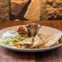 Smoked Chicken Quesadillas · Smoked chicken, pepper jack and cheddar, green chiles, roasted corn, black beans, pico de ga...
