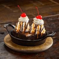 Twin Peaks Sundae · 2 scoops of vanilla ice cream on hot fudge Ghirardelli brownie.