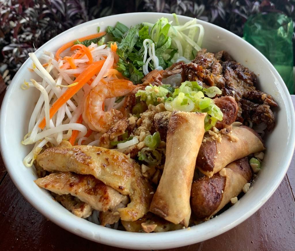 4. Special Vermicelli  · Bun dac biet. Vermicelli bowl comes with shrimps, beef, chicken, imperial rolls, lettuce, mint leaves, cucumber, bean sprouts, pickle carrot. Topped with oiled green onion and peanut. Served with fish sauce.