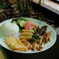 6. Combo Rice Plate  · Com dia dac biet. Broken rice with chicken, beef, shrimp, imperial rolls, and shrimp cake.