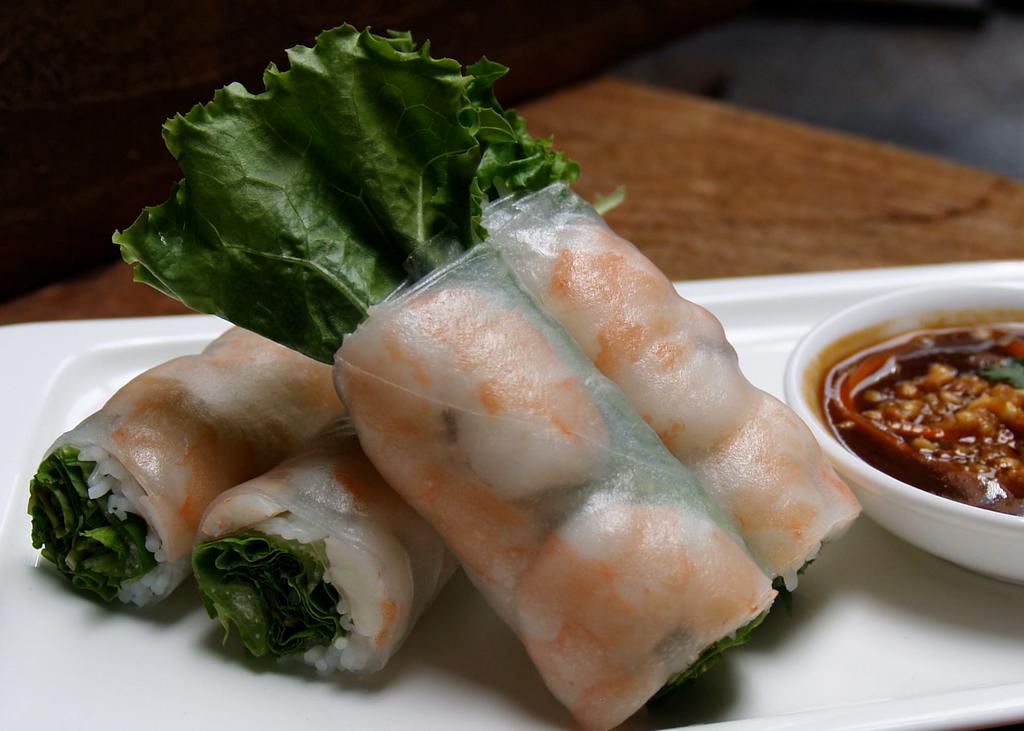 31. Two Piece Spring Rolls  · Goi cuon. Shrimp, vermicelli noodles, lettuce, mint leaves, bean sprouts wrapped in rice paper. Served with peanut sauce.