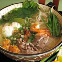 42. Combination Noodle Soup · Hu tieu thip cam. comes with beef ball, shrimp, squid, chicken, and pork. Gluten free.