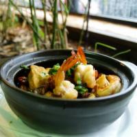 70. Nam, Tom, Tau Hu, Ca Chua, Khom Kho To · Mushroom, tomato, pineapple, shrimp, and tofu stew in clay pot.