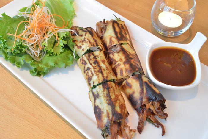 Peking Duck Crepe · Duck, scallion wrapped with thin crepe served with plum sauce.