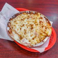 Mac & Cheese Pizza · Nacho cheese base, shredded mozzarella, macaroni and cheese, Canadian bacon, and seasoned br...