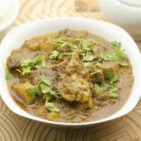 Kerala Goat Stew · A Kerala delicacy with Goat (bone in) cooked in a mellow gravy of  coconut milk, ground pepp...