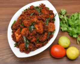 Chicken Vepudu · Tender chicken chunks cooked with onions, green chiles, ginger, garlic and curry leaves in a spicy dry masala sauce. Spicy. 
