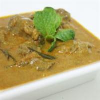 Lamb Mappas · Lamb cubes simmered in green masala, coconut milk, ground coriander seed and roasted red chi...