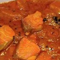 Salmon Tikka Masala · Salmon fillets chargrilled and simmered in a plum tomato and onion gravy. Flavored wth chefs...
