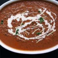 Black Lentils · Seasoned with regional spices and cooked in a mild tomato sauce, enriched with butter. Veggi...